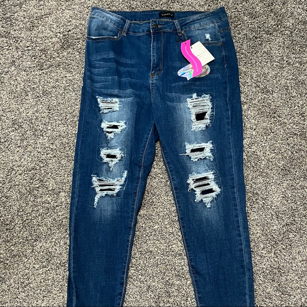 Distressed and Patched Denim Jeans